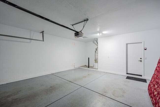 Building Photo - For Lease Beautifully Updated 4-bedroom, 2.5-Bathroom +Den, 1st Floor Office Gem, With a 2-car At...
