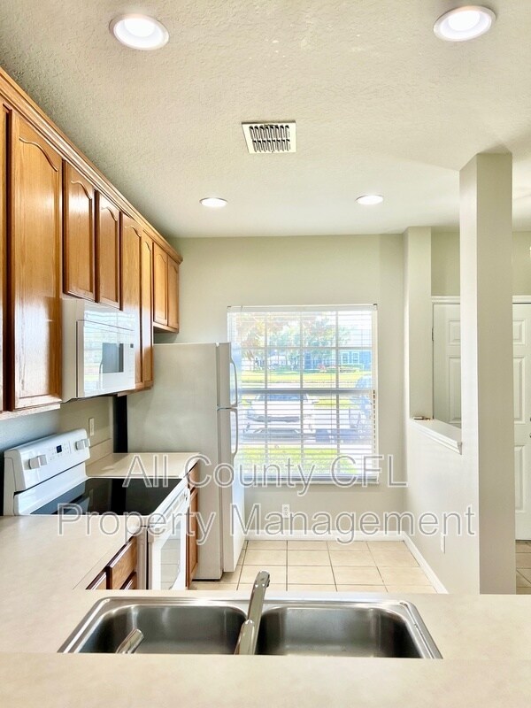 Building Photo - 9305 Jasmine Flower Ln