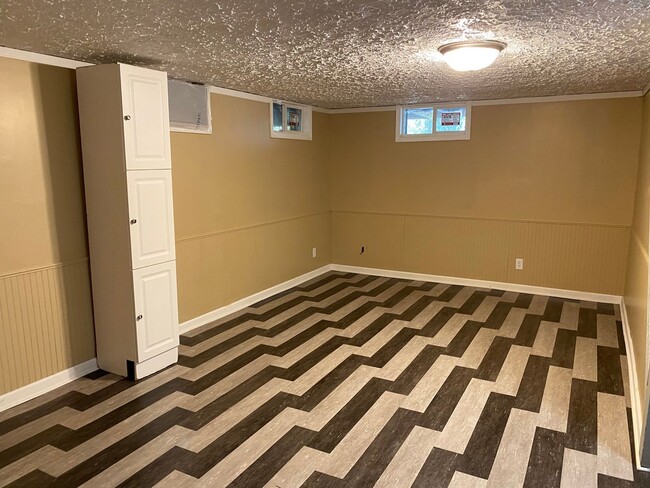 Building Photo - Spacious 4-Bedroom Home with Garage and Backyard in Milan!