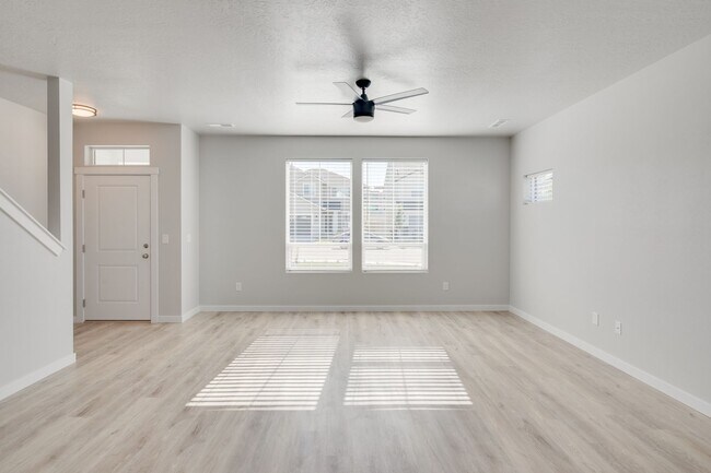 Building Photo - This gorgeous 3 bedroom, 2.5 bath townhome is 1440 square feet of HOME!