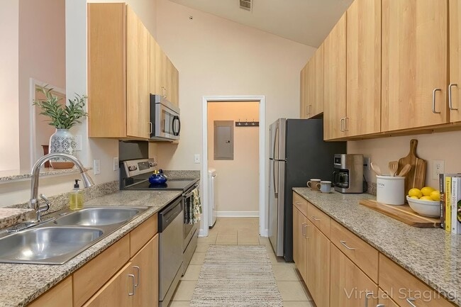 Building Photo - Bright 1-Bedroom Condo with Detached Garage in Eastwood Village Complex (Water Included)