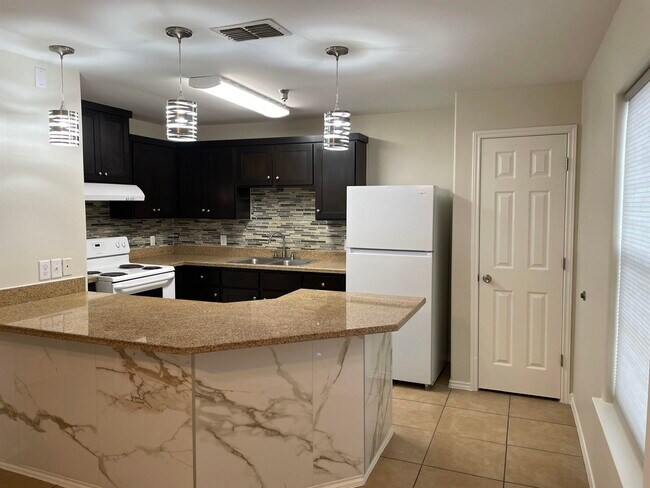 Building Photo - 5402 Marcella Ave