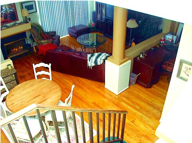 View of Dining Room (lower right) and Living Room/Fireplace (top), and Nook (with desk--right). - 18118 Flynn Dr