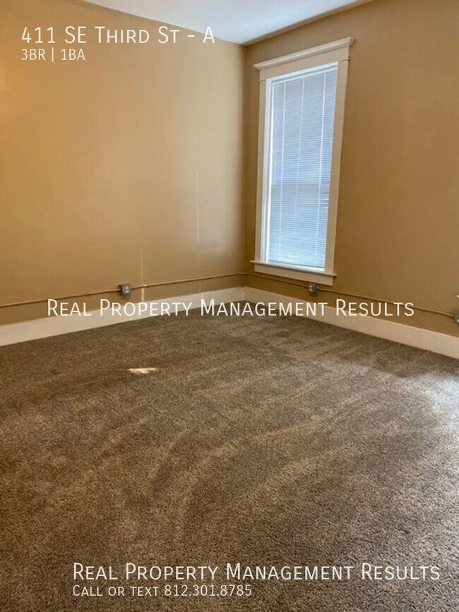 Building Photo - 411 SE Third St-A