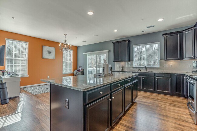 Building Photo - 3-bedroom, 2.5-bathroom condo with a great open-concept main level.