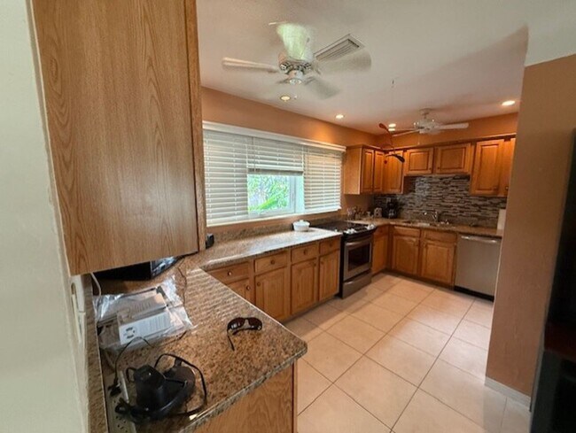 Building Photo - Well maintained 2/2 with a large yard in a...