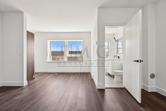 Building Photo - Sleek, Bright & Brand New — Stylish Studio in Andersonville