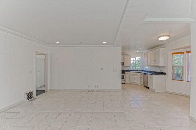 Building Photo - SPACIOUS & PARTIALLY REMODELED, 2-STORY, 3...