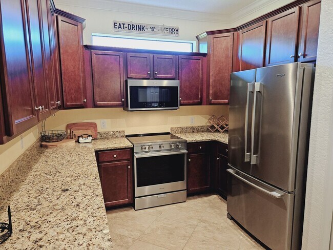 Building Photo - Annual Furnished Pet Friendly Twin Villa l...