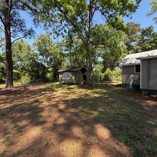 Building Photo - 6164 Highland Ave