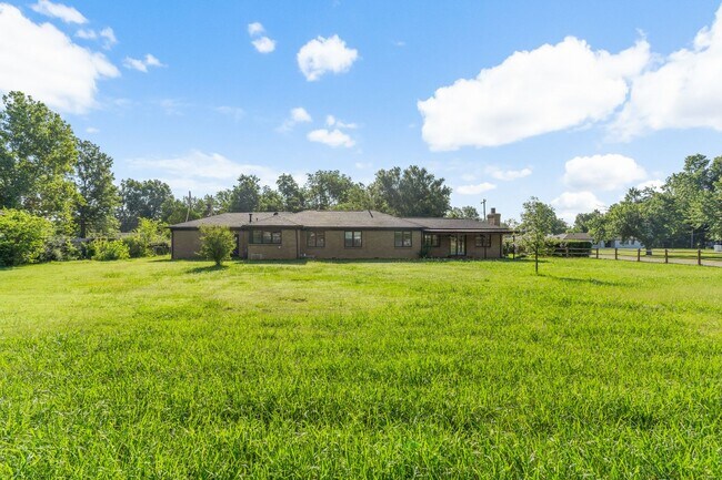 Building Photo - Newly renovated home with a large yard per...