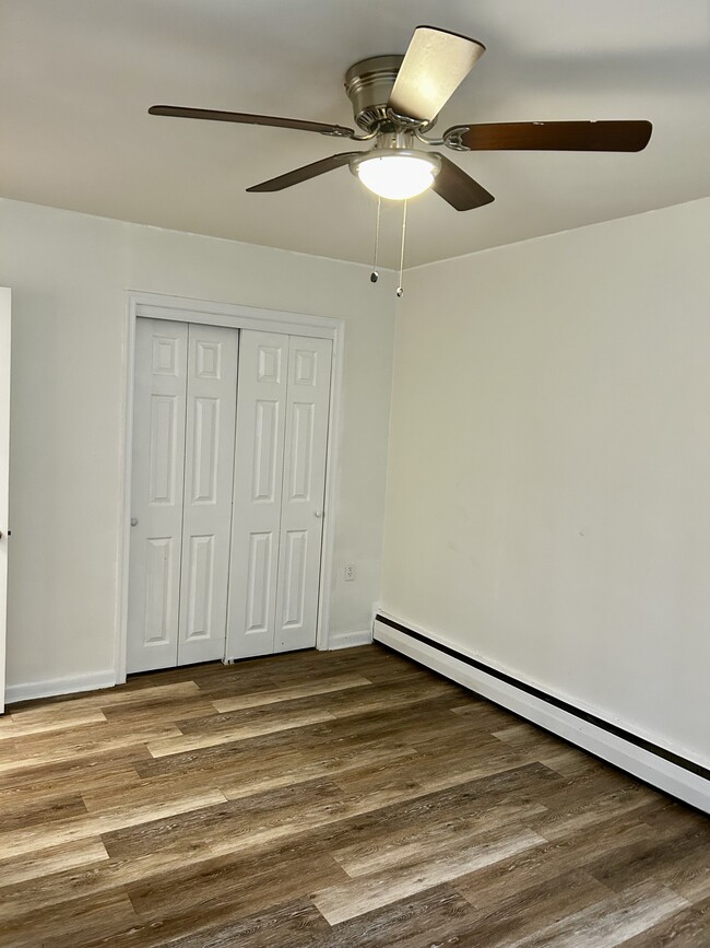 Bedroom, closet, equip with ceiling fan. - 6008 N 12th St