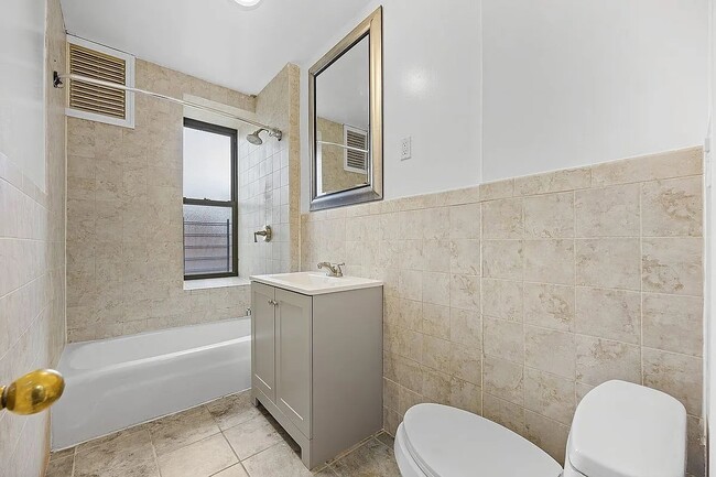 Building Photo - Welcome home to this sun-drenched 1-bedroom in the heart of Jackson Heights !