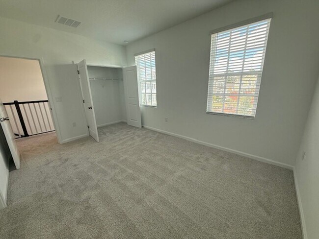 Building Photo - Brand new construction 3 Bedroom Town Home in Island Village of Celebration
