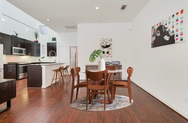Building Photo - Modern Loft w/ Rooftop Deck & Downtown Vie...