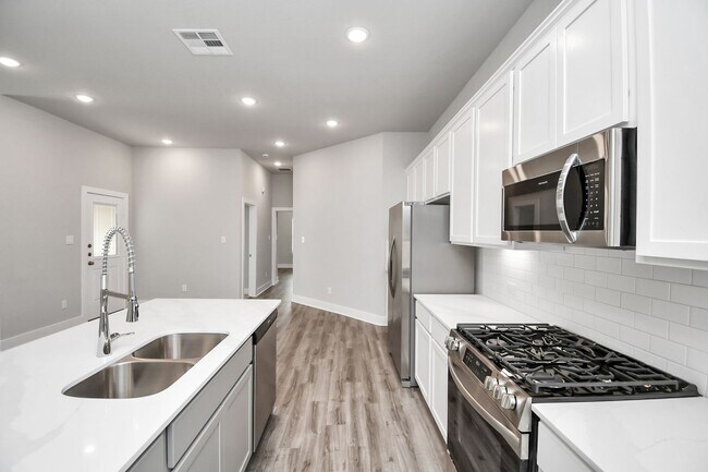 Building Photo - Welcome to the Elm — Single-Level Charm, Modern Style.