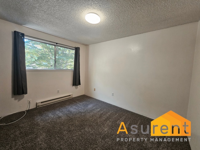 Building Photo - Bright & Spacious 2-Bedroom Apartment in A...