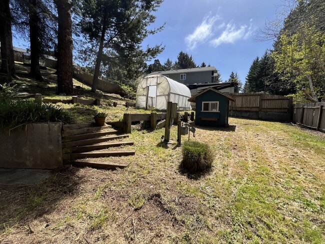 Building Photo - Custom 2-story Humboldt Hill home features 3-car garage, spacious pet-friendly yard