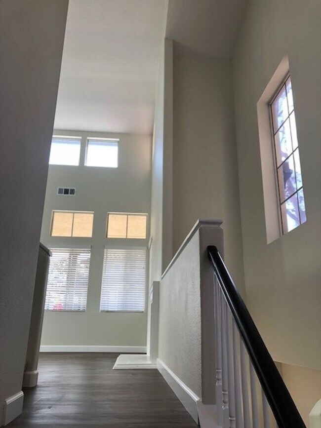 Building Photo - PICTURE PERFECT 2 BR/2 BATH PLUS LOFT END UNIT CONDO WITH DIRECT ACCESS 2 CAR GARAGE