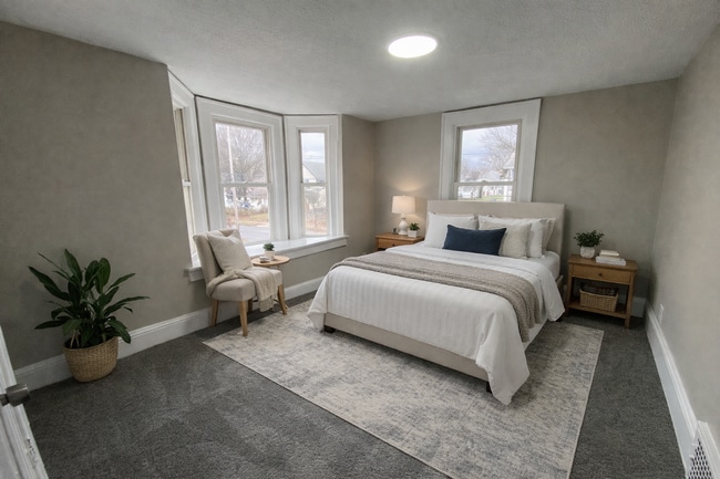 Building Photo - More Space Than You’d Expect: Updated 3BR w/ 1.5 Baths + Carpeted Attic Bonus