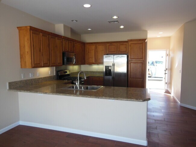 Building Photo - Swamp Cooler, Central AC and Tile Throughout!