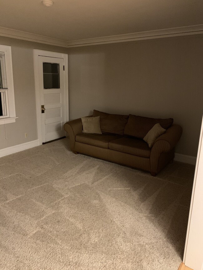 Doorway leads from living room (14'x12') to porch at front of unit - 2130 N 62nd St