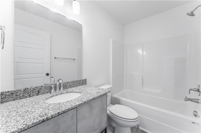 Building Photo - LEASING SPECIAL! 1/2 OFF FIRST MONTHS RENT - Featherston Village - Modern Living