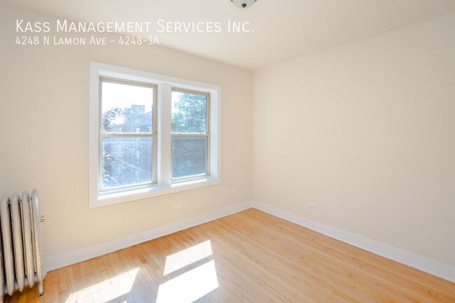 Building Photo - 4248 N Lamon Ave