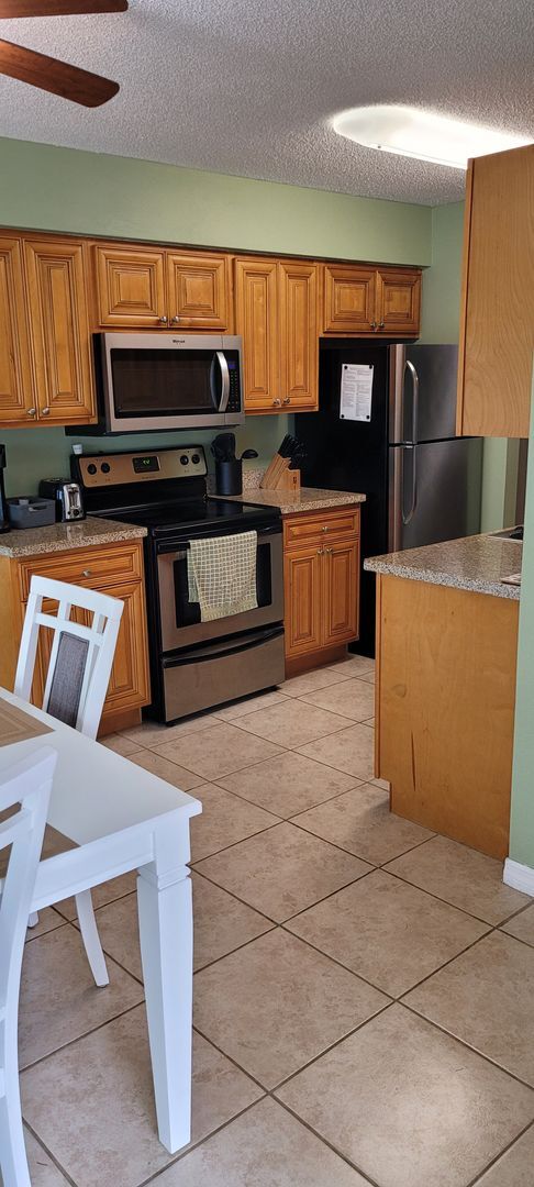 Building Photo - Funished Resort Style Condo in Gated Community- River Front