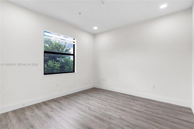 Building Photo - 8005 NW 104th Ave