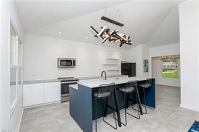 Building Photo - 4 BED/3 BATH LOCATED IN A WATERFRONT COMMU...