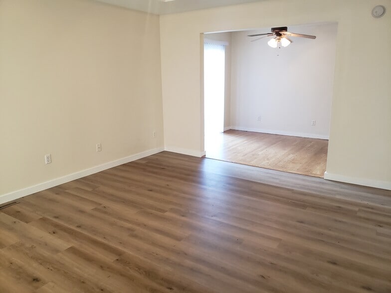 Living room with hardwood floors - 2977 West Village Lane