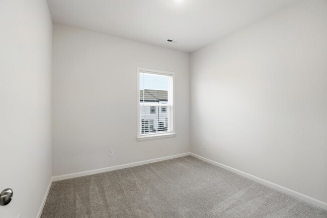 Building Photo - Brand-new three-story townhome in the University area at Senata at Research Park!