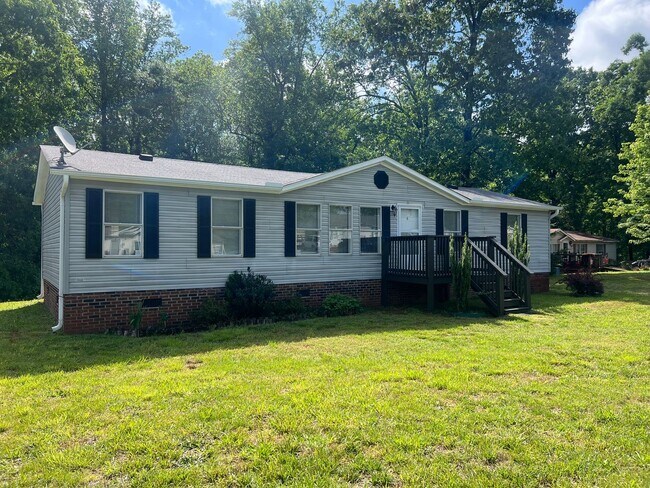 Primary Photo - Introducing a charming 4-bedroom, 2-bathro...