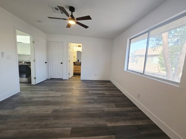 Building Photo - Stylish Green Valley Townhome – Upgraded 2 Bed 2 Bath with Private Garage & Covered Deck