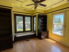 Building Photo - Freshly painted charming eccentric small Victorian house