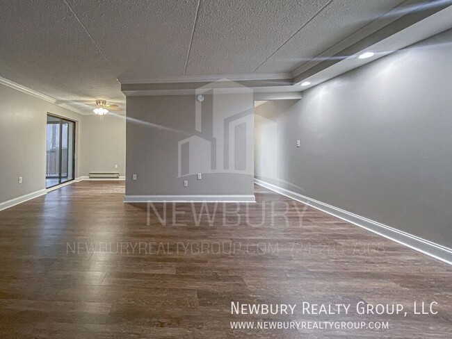 Building Photo - Luxury 1-Bedroom Penthouse with Modern Ren...