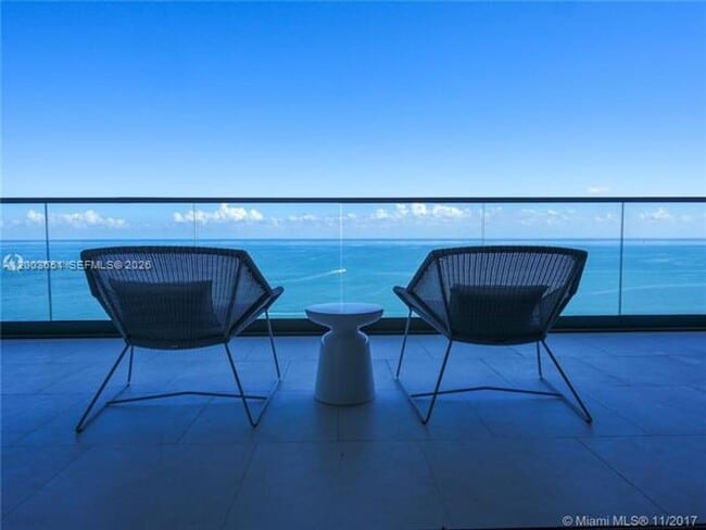 Building Photo - 10201 Collins Ave