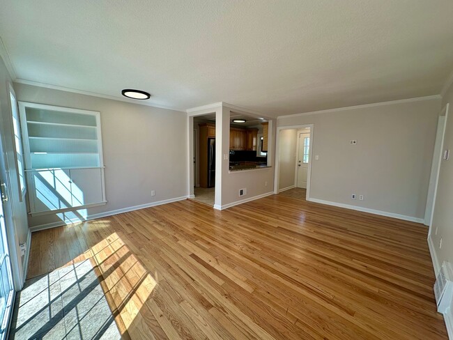 Building Photo - {5221} Updated Prairie Village Ranch + Fenced Yard + One Car Garage