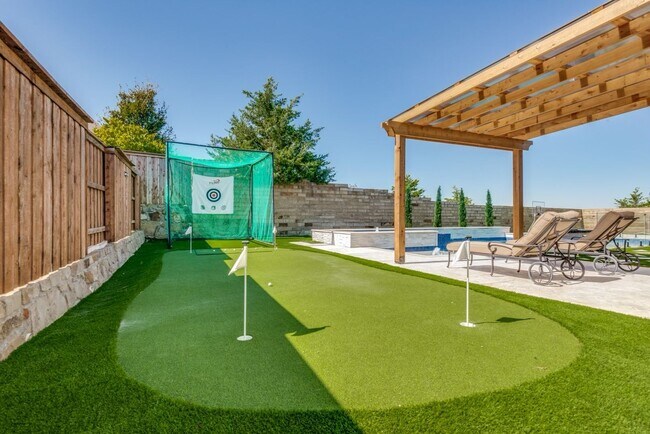 Building Photo - A must see in highly sought after Windsong...