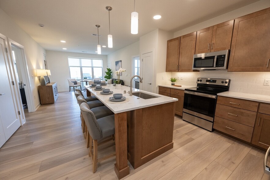 Open concept kitchen - Highlands at Aero Park Apartments & Townhomes 55+