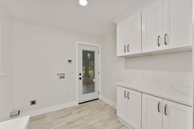 Building Photo - Charming 3-Bedroom Bungalow with Solar and 2-Car Garage