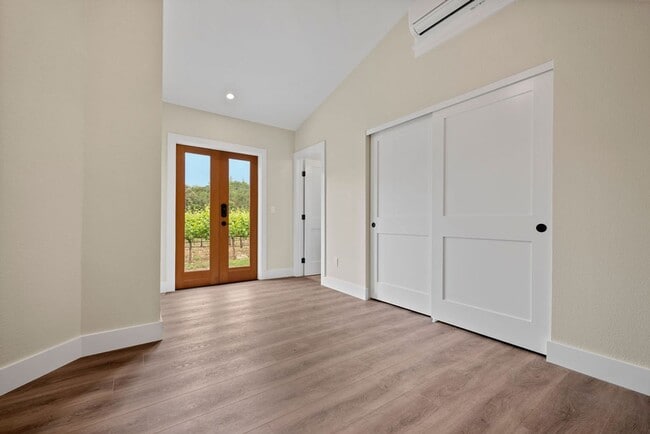 Building Photo - 2 bedroom 2 bath with one car garage on a gated property surrounded by vineyard views Water and S...