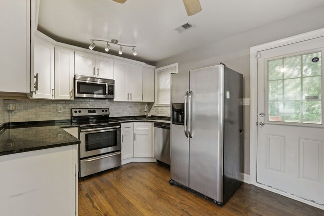 Building Photo - Move-In Ready Cape Cod with 3 Finished Levels & Huge Backyard