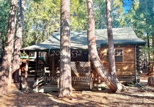 Building Photo - Rustic Retreat: Charming 1-Bedroom Log Cab...