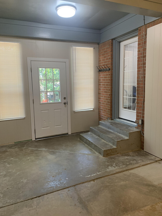 View of enclosed porch from back door off kitchen - 3150 Ray Dr W