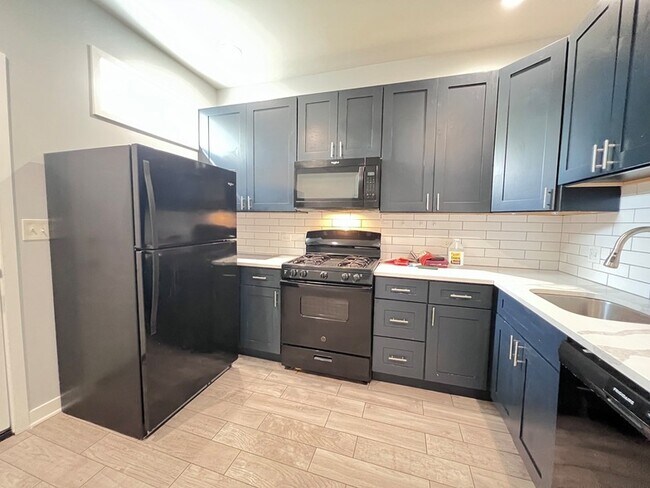 Building Photo - 6402 S Eberhart Ave