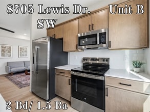 Building Photo - Big Ben at the Loop – Brand New 2 Bedroom Condo Attached 2-Stall Garage