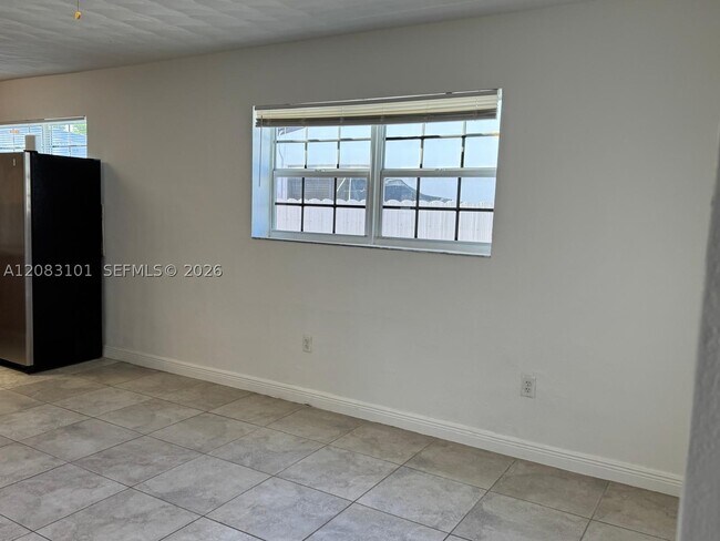 Building Photo - 3650 SW 92nd Ave