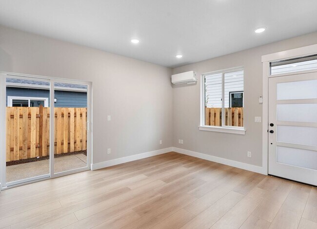 Building Photo - Brand-New Detached 2 Bedroom Home with Private Fenced Yard and Designer Finishes